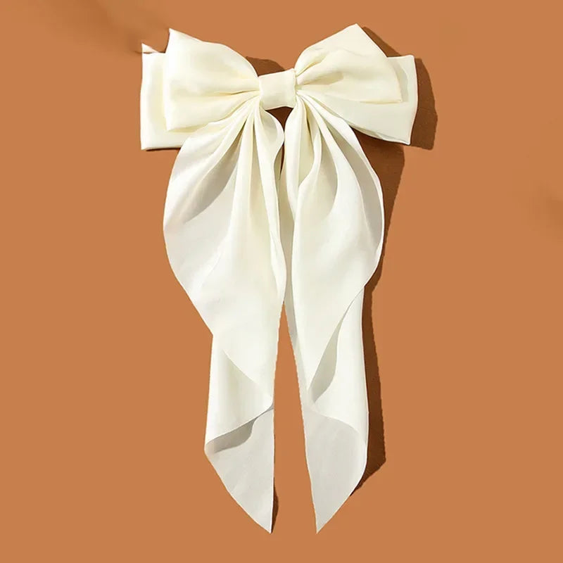 Large white bow on a brown background