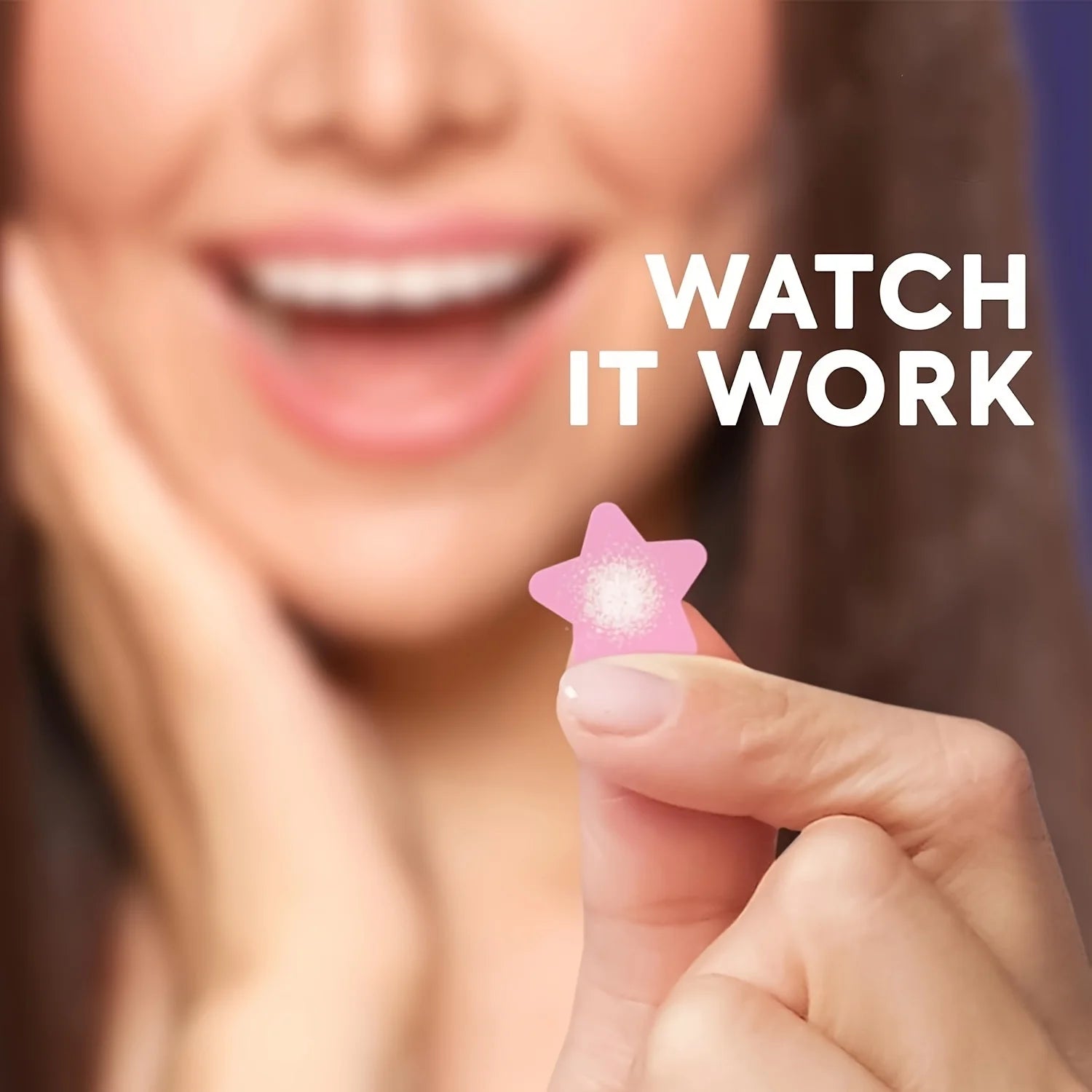 Person holding a pink star-shaped object with 'WATCH IT WORK' text overlay
