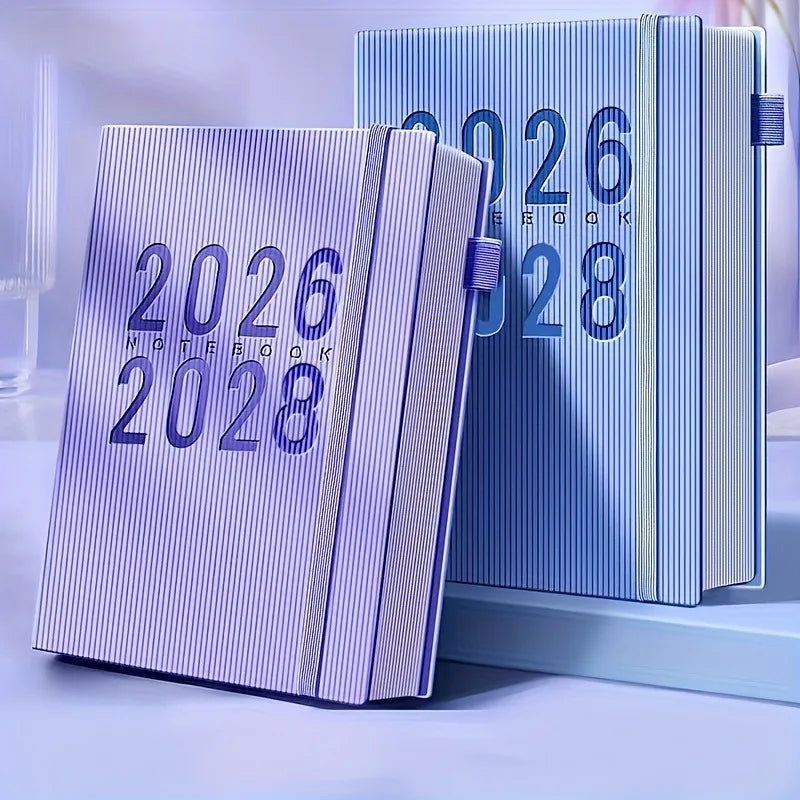 Two notebooks with '2026' and '2028' text on a light blue background