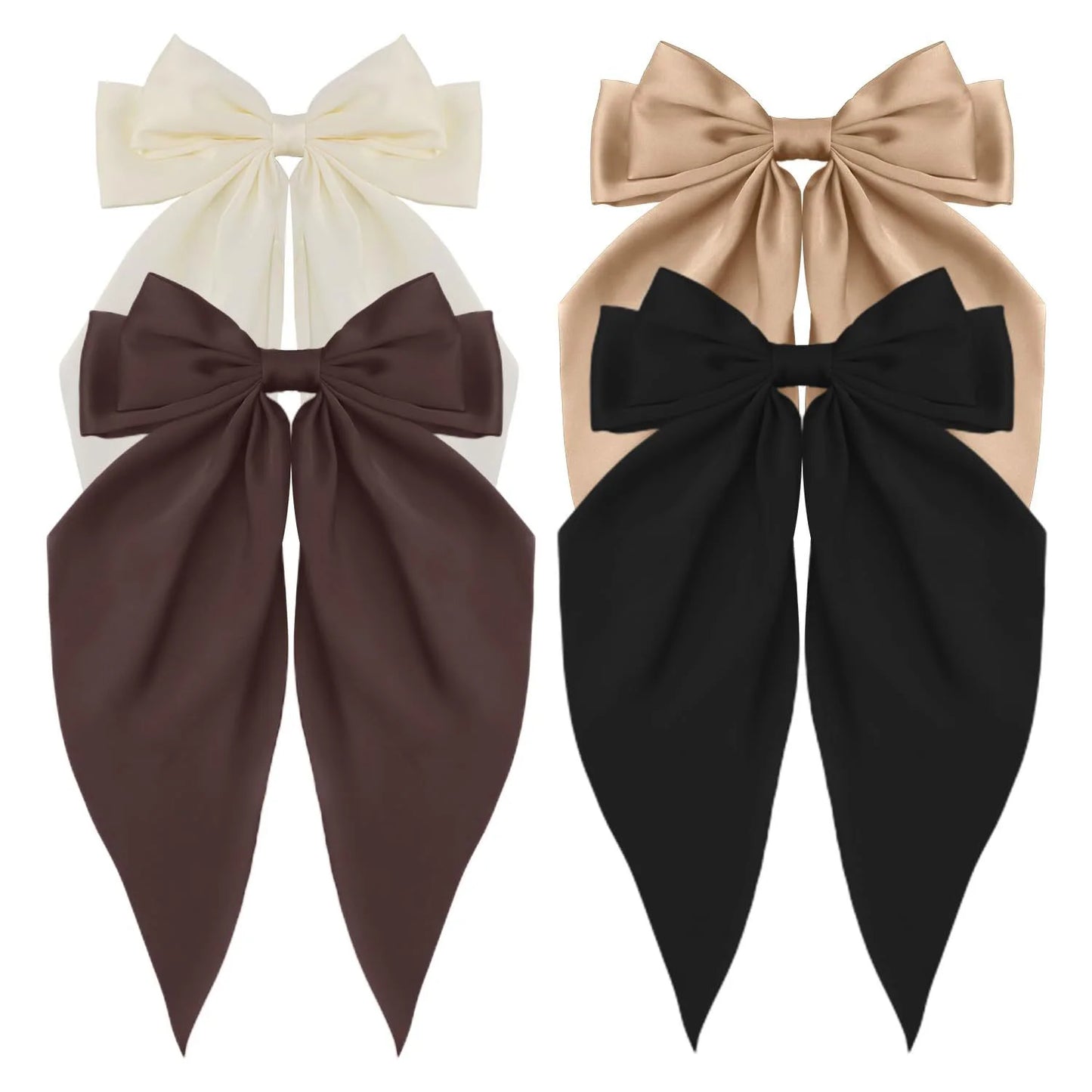 Four large bow hair accessories in different colors on a white background